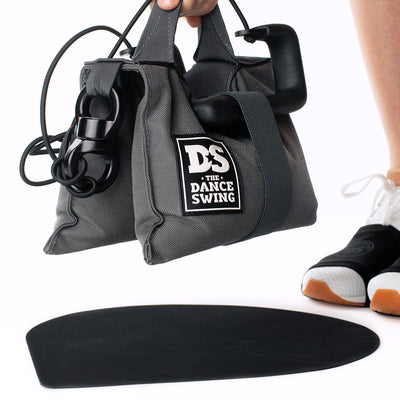 The Dance Swing improves solo dance practice and dance lessons by adding connection.   Great for Swing Dance, Salsa Dance, Bachata and most social dances.  Includes Handles, 20lb Steel Shot bag with Rock Exotica swivel, Non Slip mat.